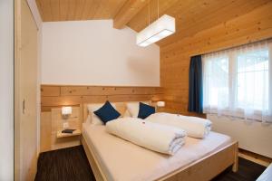 Postel nebo postele na pokoji v ubytování Boutique-Hotel Vincenz + 37 fotografií