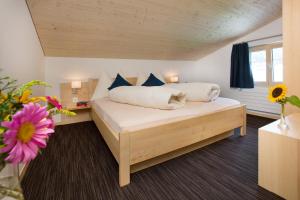 Postel nebo postele na pokoji v ubytování Boutique-Hotel Vincenz