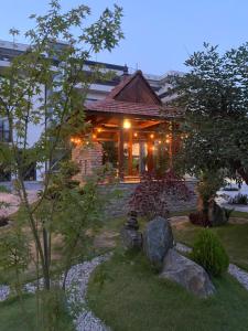 Ein Garten an der Unterkunft Uma Residence and Suites