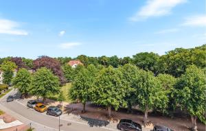 an overhead view of a parking lot with trees at Lovely Apartment In Kühlungsborn in Kühlungsborn +12 photos