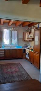 Kuchyň nebo kuchyňský kout v ubytování B&B Palmagrill + 31 fotografií