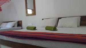 Postel nebo postele na pokoji v ubytování Paramount Safari Cottage