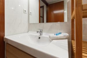 A bathroom at Portal Del Angel Barcelona Apartment