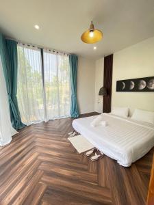 3pok-Riverside maewangjinxiang客房内的一张或多张床位