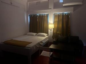 Raj Andar Guest House客房内的一张或多张床位