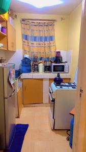 Kuchyň nebo kuchyňský kout v ubytování 7 Mogotio