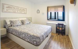 Katil atau katil-katil dalam bilik di 2 Bedroom Nice Apartment In Siboralos +7 gambar