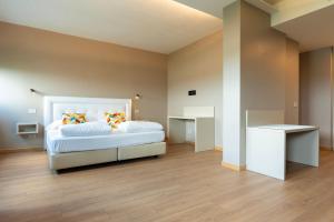 Voodi või voodid majutusasutuse Hotel Saccardi & Spa - Adults Only toas