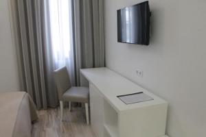 TV a/nebo společenská místnost v ubytování Seculo Soft