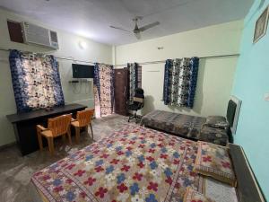Postel nebo postele na pokoji v ubytování GARG COMPLEX GUESTHOUSE