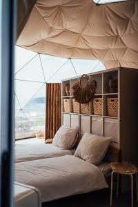 Postel nebo postele na pokoji v ubytování Glamping Blessed - Adult Only