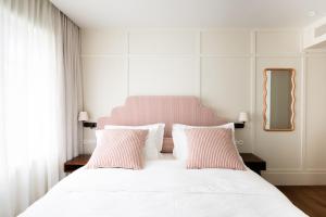 Postel nebo postele na pokoji v ubytování Hotel Villa Bonnie