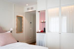 Postel nebo postele na pokoji v ubytování Hotel Villa Bonnie