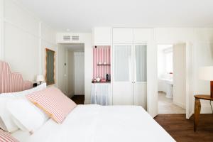 Postel nebo postele na pokoji v ubytování Hotel Villa Bonnie