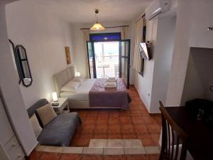 Kapetaniou Apartments客房内的一张或多张床位