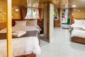 Postel nebo postele na pokoji v ubytování Robins Guesthouse