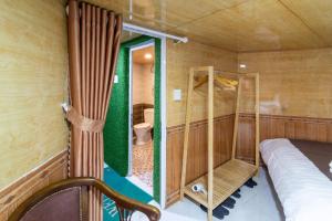 Postel nebo postele na pokoji v ubytování Robins Guesthouse