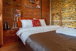 Postel nebo postele na pokoji v ubytování Robins Guesthouse