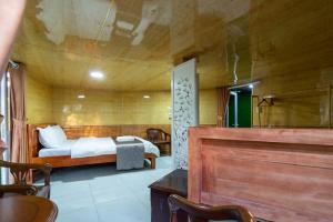 Postel nebo postele na pokoji v ubytování Robins Guesthouse