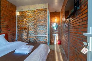 Postel nebo postele na pokoji v ubytování Robins Guesthouse