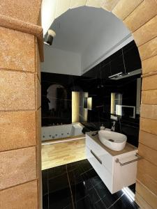 Un baño de AG SUITE TRAPANI