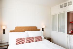 Postel nebo postele na pokoji v ubytování Hotel Villa Bonnie