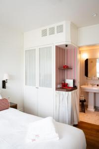 Postel nebo postele na pokoji v ubytování Hotel Villa Bonnie