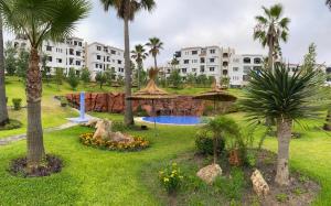 Bazén v ubytování Appartement climatisé vue piscine - Lilacs garden CaboNegro nebo v jeho okolí