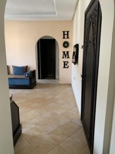 Posezení v ubytování Appartement climatisé vue piscine - Lilacs garden CaboNegro