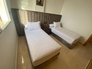Postel nebo postele na pokoji v ubytování Apartment Familiale Al-Hoceima, Vue sur mer