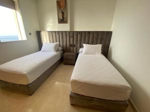 Postel nebo postele na pokoji v ubytování Apartment Familiale Al-Hoceima, Vue sur mer