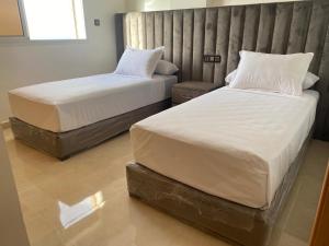 Postel nebo postele na pokoji v ubytování Apartment Familiale Al-Hoceima, Vue sur mer