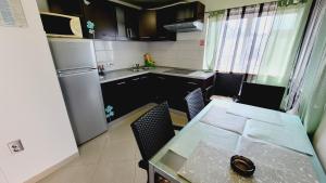 Kuchyň nebo kuchyňský kout v ubytování Apartments Veronika