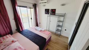 Postel nebo postele na pokoji v ubytování Apartments Veronika