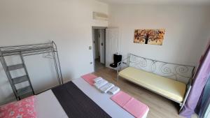 Postel nebo postele na pokoji v ubytování Apartments Veronika