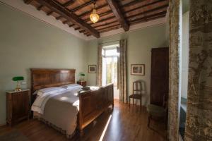 Postel nebo postele na pokoji v ubytování Al Porto Di Lucca B&B