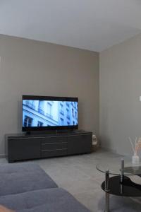 Μια τηλεόραση ή/και κέντρο ψυχαγωγίας στο Maison 3 chambres 90 m