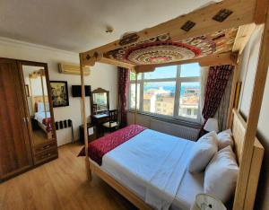 Postel nebo postele na pokoji v ubytování Marmara Guesthouse