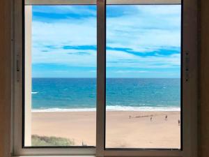 a view of the beach from a window at Banana Beach in Marbella
