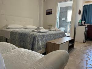 Postel nebo postele na pokoji v ubytování B&B Villa Méditerranée con parking space