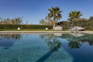 Bazén v ubytování Iniada Villas nebo v jeho okolí + 106 fotografií