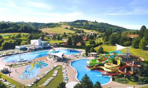an aerial view of a water park with a water slide at Apartman Karas in Sveti Martin na Muri