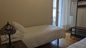 Postel nebo postele na pokoji v ubytování Apartamento Ábside de San Juan I