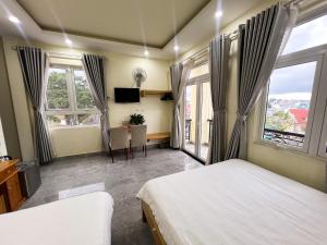Postel nebo postele na pokoji v ubytování Phùng Thịnh Hotel