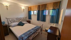Postel nebo postele na pokoji v ubytování Paradies Apartments Prizba