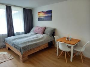 Postel nebo postele na pokoji v ubytování Apartment Auszeit Strobl