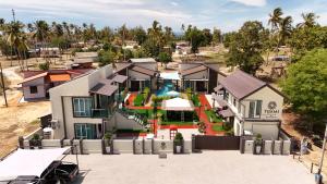 an aerial view of a house with a pool at Tijami Villa & Resort in Kampong Mangkok