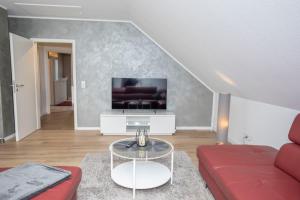 Et tv og/eller underholdning på Ferienwohnung Peters