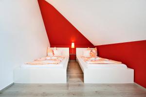 Postel nebo postele na pokoji v ubytování Ferienwohnung Uta