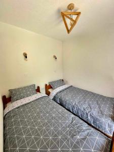 a room with two beds in a room at Guest House Queen in Konjic +54 photos